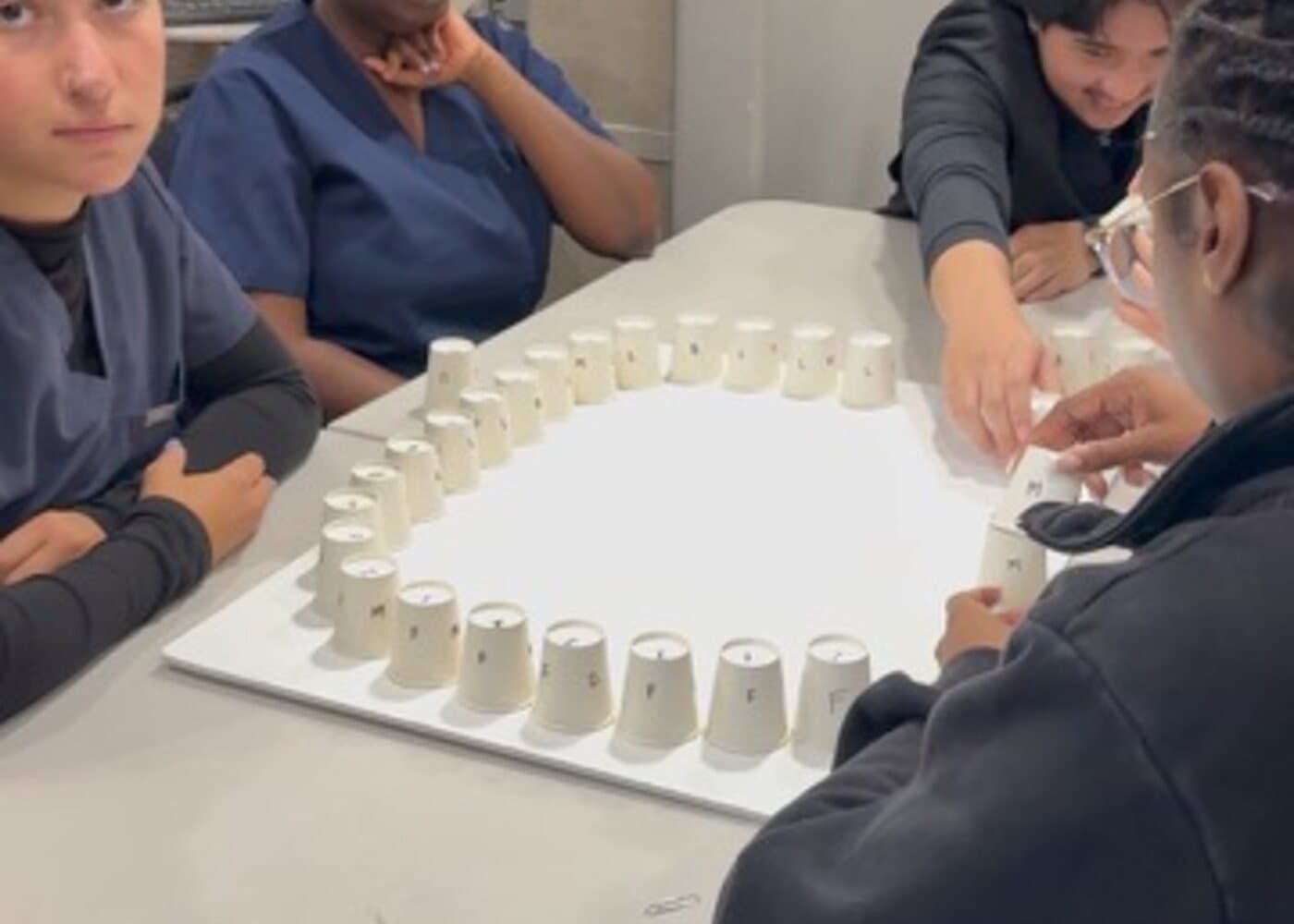 Students practicing dental anatomy and typodont skills
